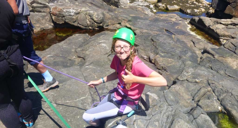 girls learn to rock climb in maine
